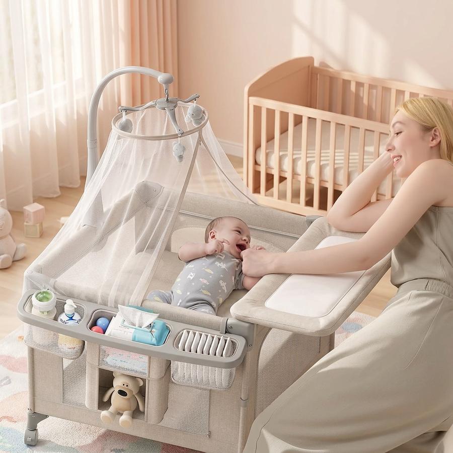 Newborn first two weeks at home with TinyGlow bassinet, mosquito-net canopy deployed