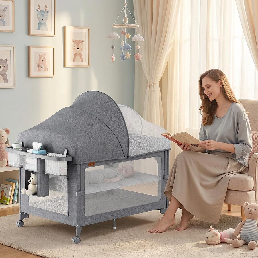 Sunday living-room nap with TinyGlow wheeled into kitchen-adjacent sightline